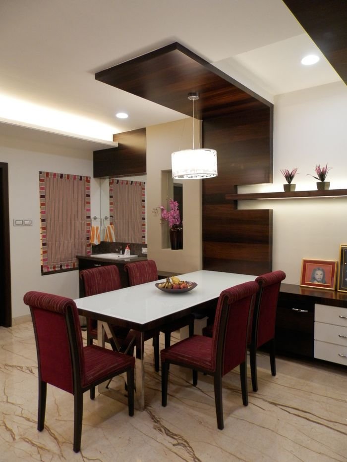 contact-img Contemporary dining room with sleek furniture and stylish decor. Ideal for interior design inspiration.